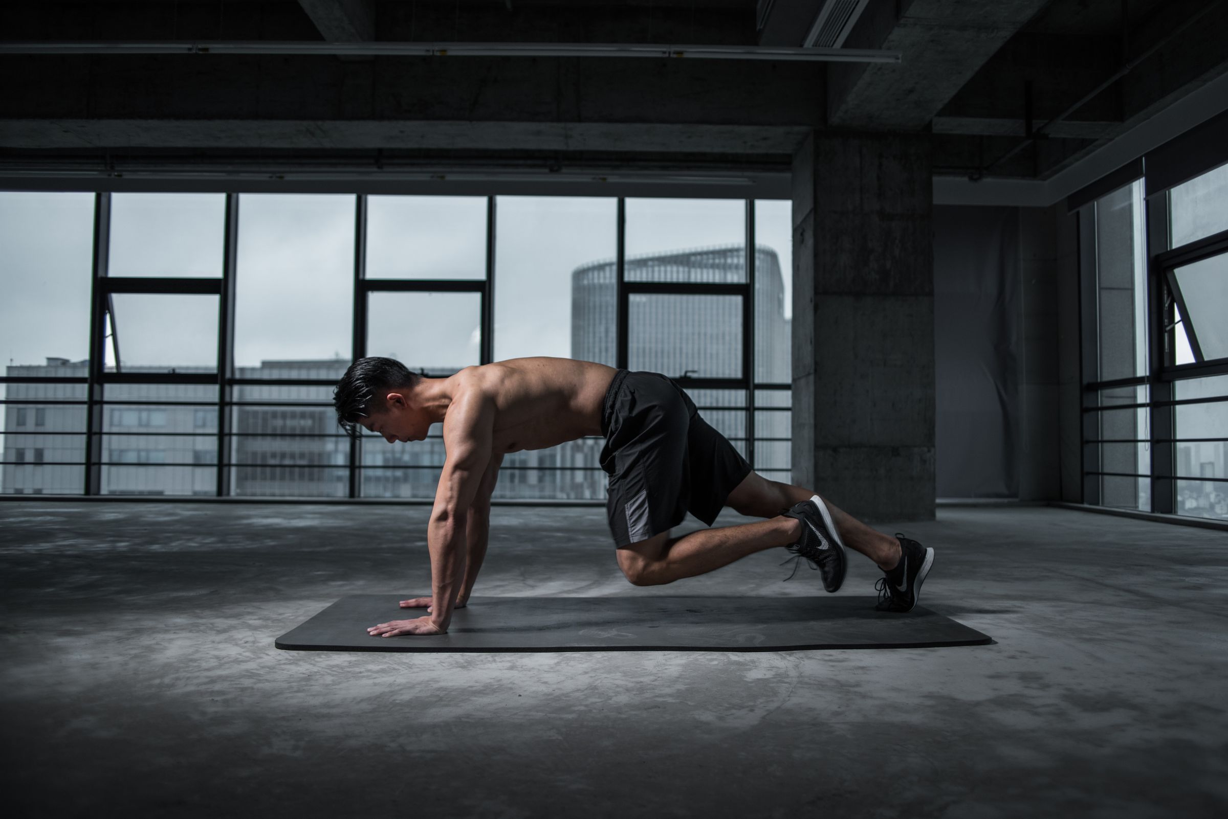 Athlete training in an industrial performance space